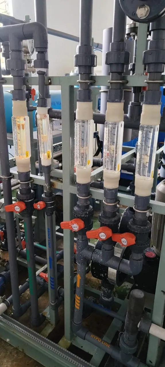 Process flow meters and control valves on a treatment skid
